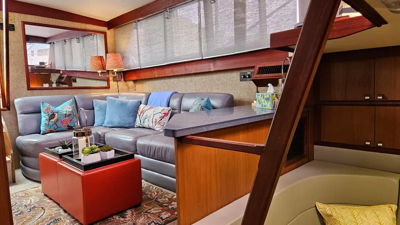 Slide: The Image of Luxurious interior of a 1980 Viking 43 Double Cabin yacht with cozy seating and decor. - 20