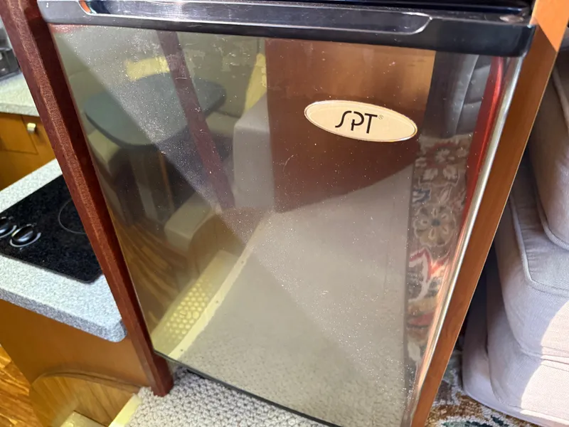 Slide: The Image of SPT refrigerator inside a 1980 Viking 43 Double Cabin yacht kitchen. - 28