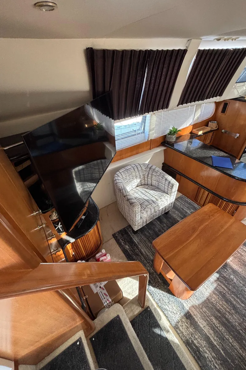 Slide: The Image of Interior of 2001 Carver 396 Aft Cabin MY with modern furnishings and natural light. - 47
