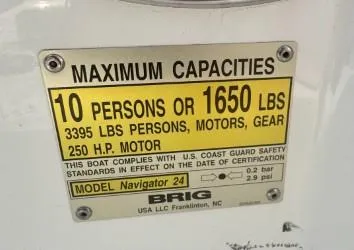 Slide: The Image of Capacity plate for Brig Navigator 2026, 10 persons or 1650 lbs, 250 HP motor. - 11