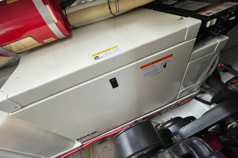 Slide: The Image of Engine compartment of a 2006 Four Winns 318 Vista with Kohler power system. - 37