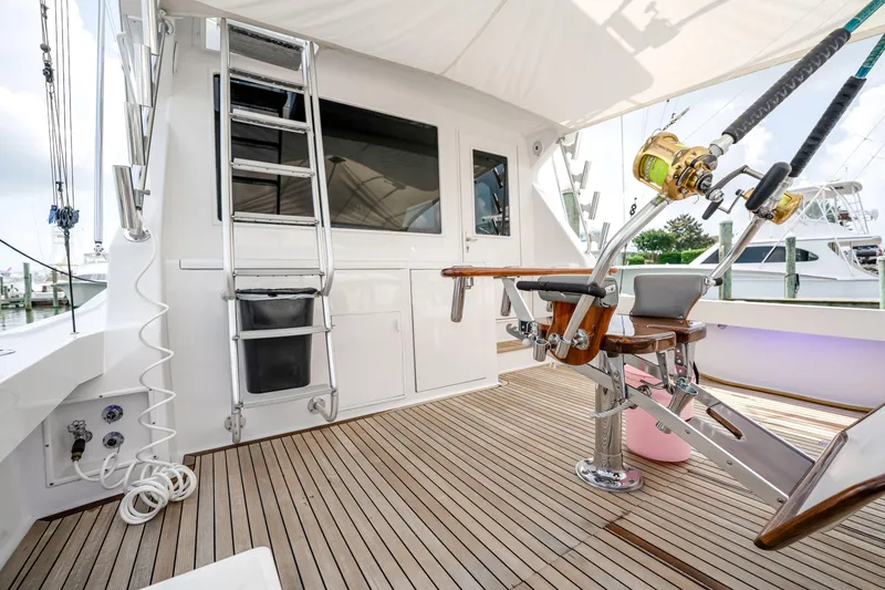 Slide: The Image of Fishing deck of a 1995 Viking 50 yacht with rod holders and ladder. - 39