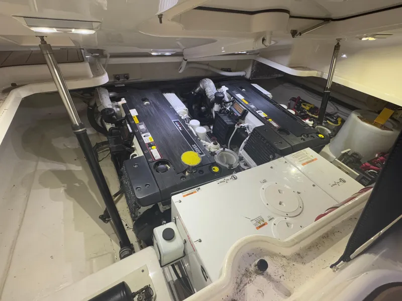 Slide: The Image of Engine room of 2011 Tiara Yachts 3900 Sovran, showcasing dual engines and mechanical components. - 11