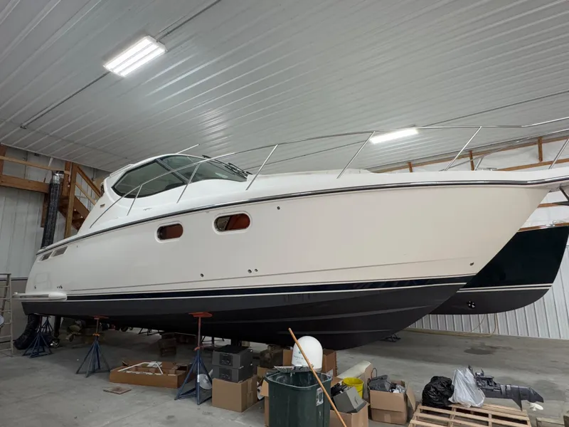 Slide: The Image of 2011 Tiara Yachts 3900 Sovran in storage, side view in a warehouse. - 5