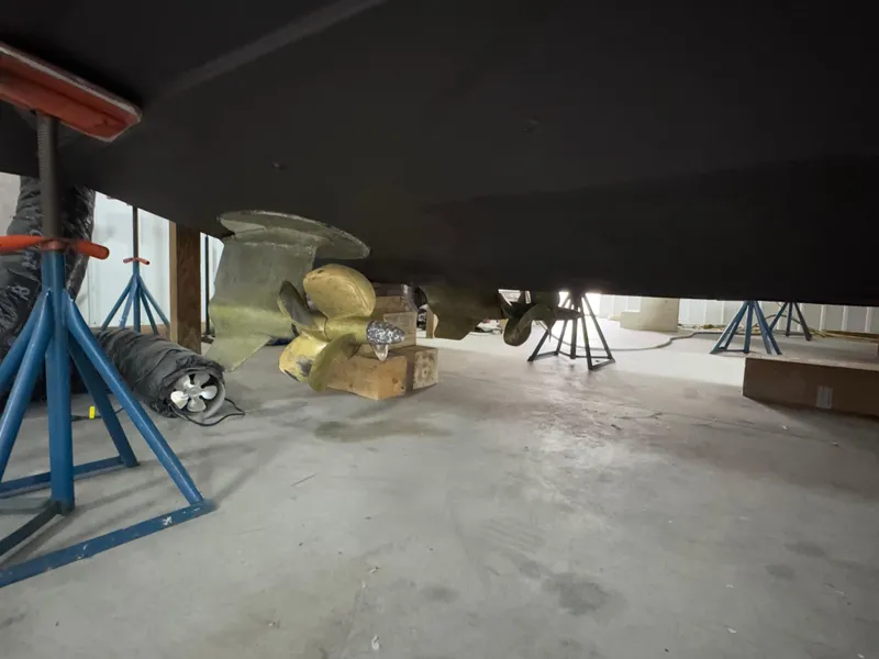 Slide: The Image of 2011 Tiara Yachts 3900 Sovran propeller and hull in a maintenance facility. - 6