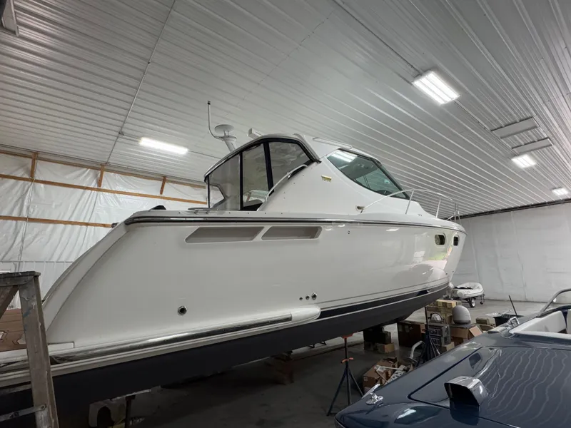 Slide: The Image of 2011 Tiara Yachts 3900 Sovran in indoor storage, side view. - 7