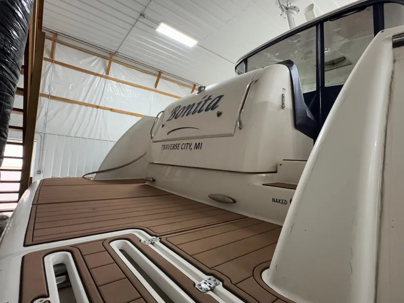Slide: The Image of 2011 Tiara Yachts 3900 Sovran docked in Traverse City, MI, with teak deck. - 8