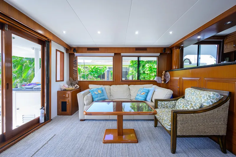 Slide: The Image of Luxurious interior of 2001 Ocean Alexander 602 yacht with elegant seating and wooden accents. - 2