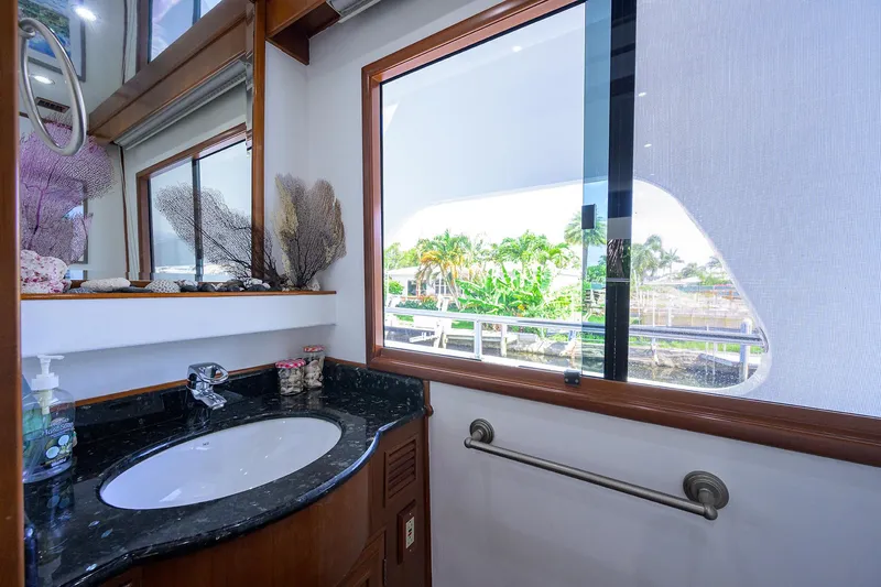 Slide: The Image of Luxurious bathroom interior of 2001 Ocean Alexander 602 yacht with scenic window view. - 8
