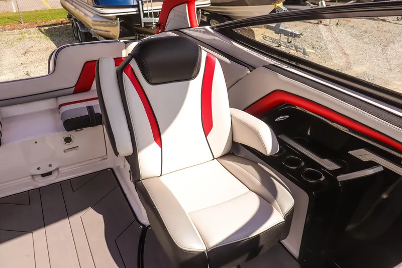 Slide: The Image of 2019 Yamaha Boats 242X E-Series interior with stylish seating and modern design. - 16