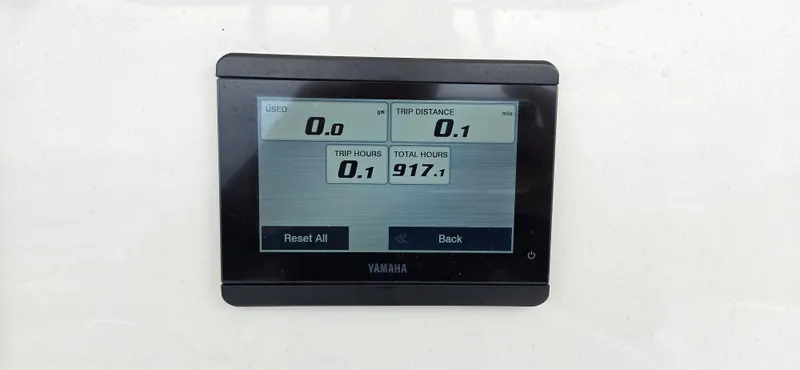 Slide: The Image of Yamaha display showing trip data on 2023 Cobia 220 Center Console boat. - 12