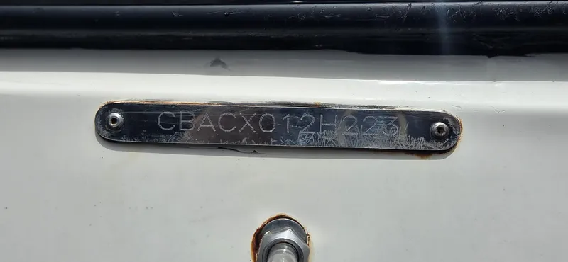 Slide: The Image of Hull identification number on 2023 Cobia 220 Center Console boat. - 17