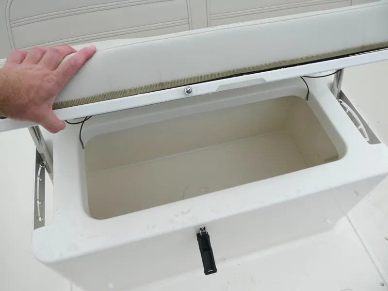 Slide: The Image of 2025 Boston Whaler 170 Montauk seat storage compartment with open lid. - 5