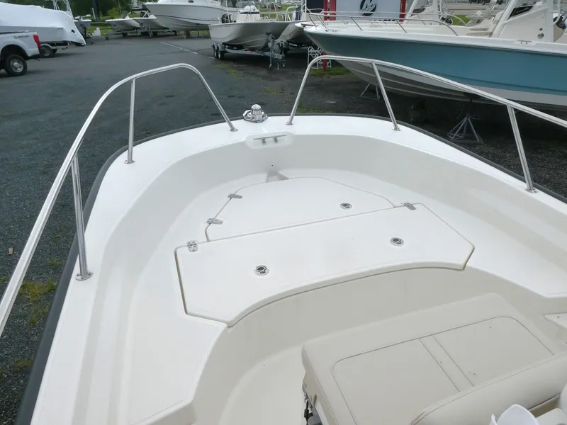 Slide: The Image of 2025 Boston Whaler 170 Montauk boat interior, featuring spacious seating and sleek design. - 8