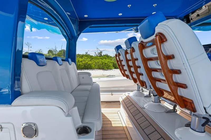 Slide: The Image of Luxurious interior of 2020 HCB 53 boat with plush seating and wooden accents. - 32