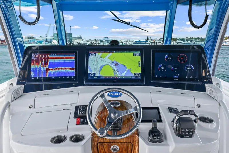 Slide: The Image of Helm of 2020 HCB 53 boat with advanced navigation and control systems. - 39