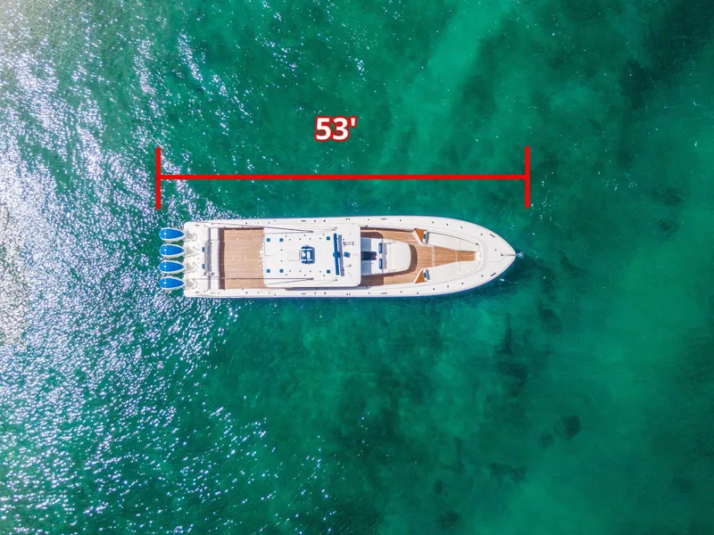 Slide: The Image of Aerial view of 2020 HCB 53-foot yacht on turquoise water. - 44