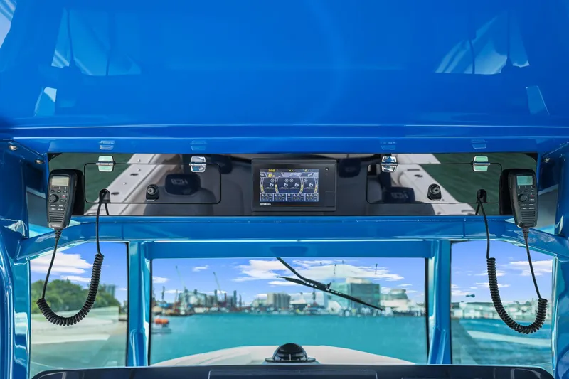 Slide: The Image of Interior view of a 2020 HCB 53 boat cockpit with navigation equipment. - 7