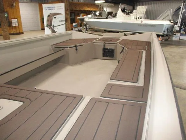 Slide: The Image of 2025 Reaper Boats 656-MUD interior with spacious seating and modern design. - 3