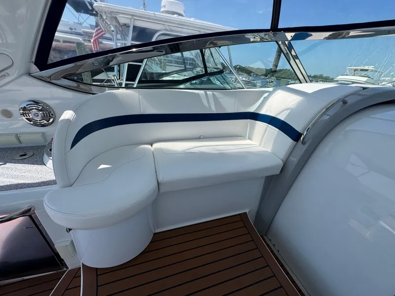 Slide: The Image of 2008 Formula 40 PC yacht interior with white seating and blue accents. - 16