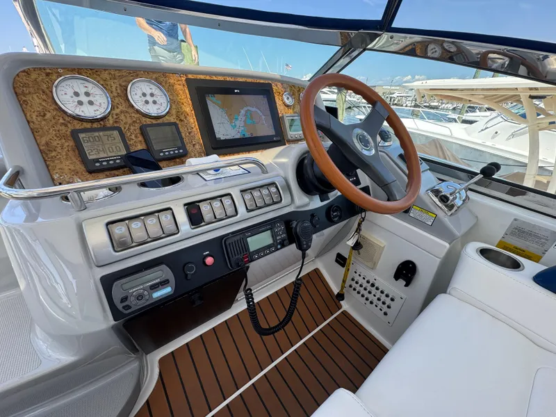 Slide: The Image of Helm of 2008 Formula 40 PC boat with navigation instruments and wooden steering wheel. - 18