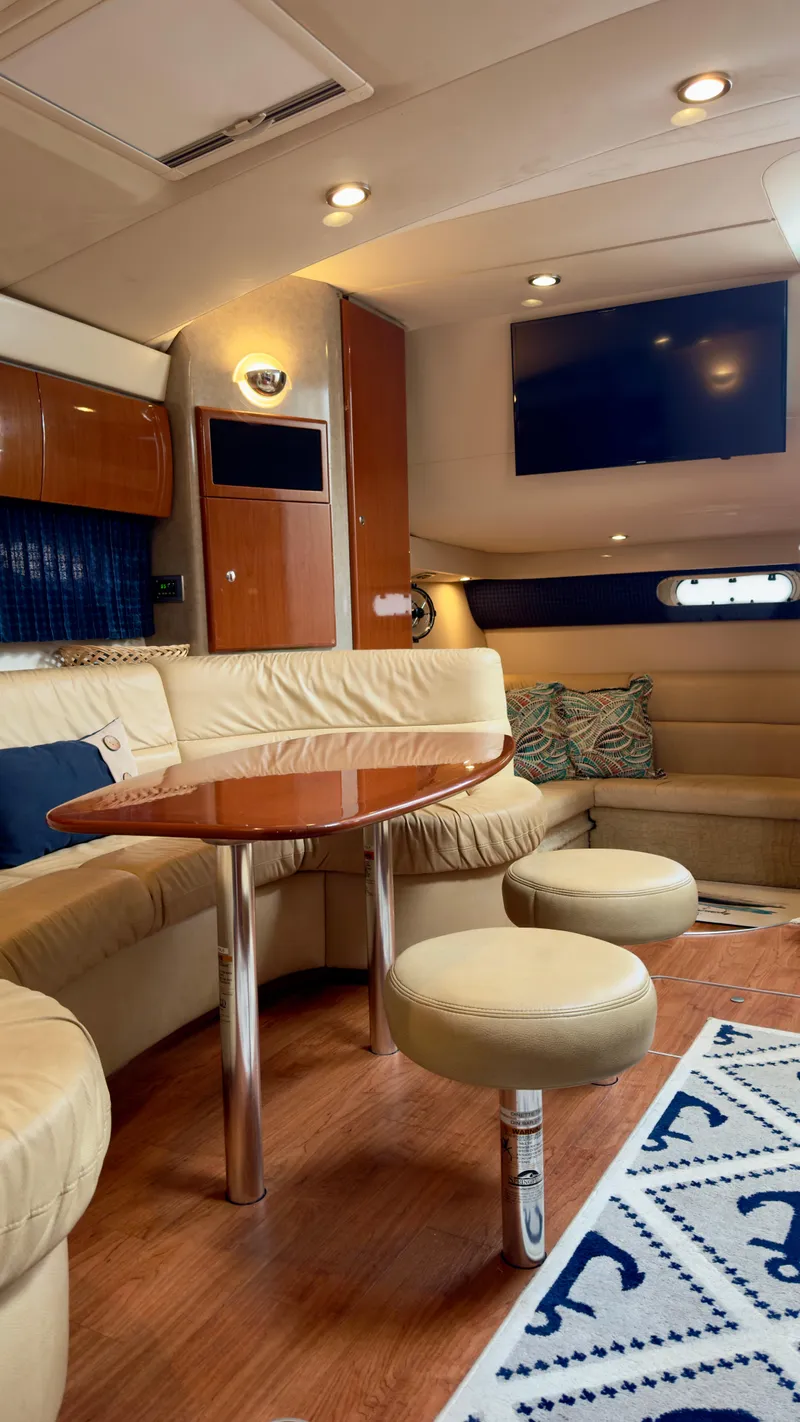 Slide: The Image of Luxurious interior of a 2008 Formula 40 PC yacht with elegant seating and modern amenities. - 26
