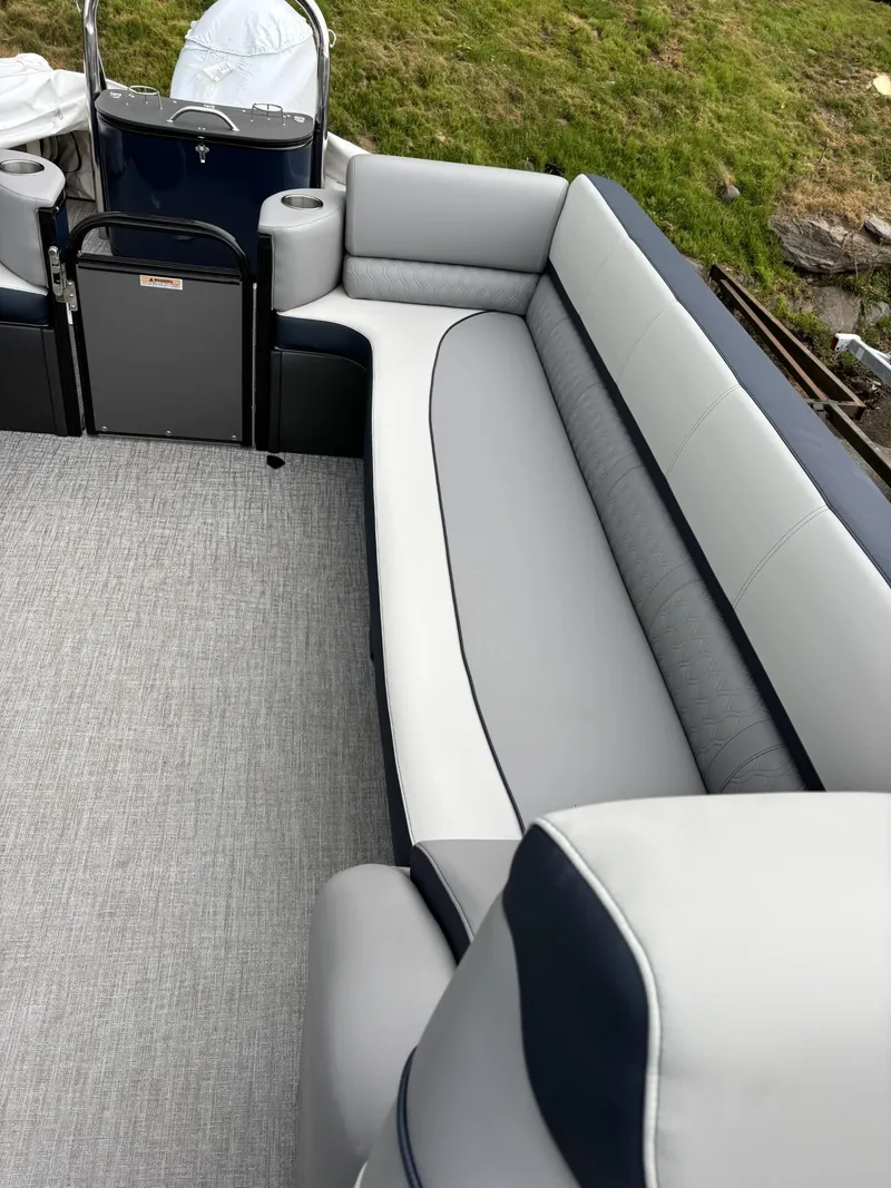 Slide: The Image of 2025 Avalon Catalina Quad Lounger Windshield interior with plush seating and modern design. - 6