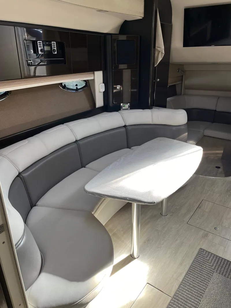 Slide: The Image of 2016 Formula 37 PC yacht interior with curved seating and modern design. - 11