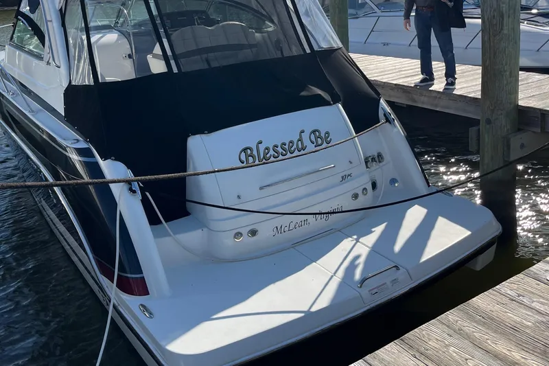 Slide: The Image of 2016 Formula 37 PC boat named "Blessed Be" docked at a marina. - 6