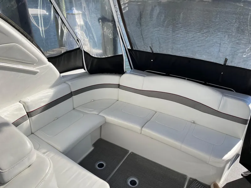 Slide: The Image of 2016 Formula 37 PC yacht interior with white leather seating and water view. - 8
