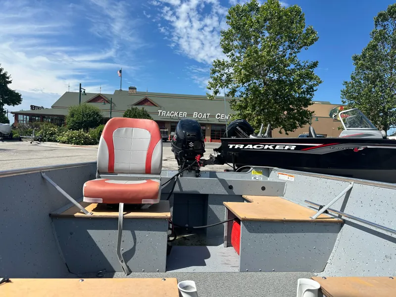 Slide: The Image of 2021 Lund SSV-16 boat interior at Tracker Boat Center, sunny day. - 3