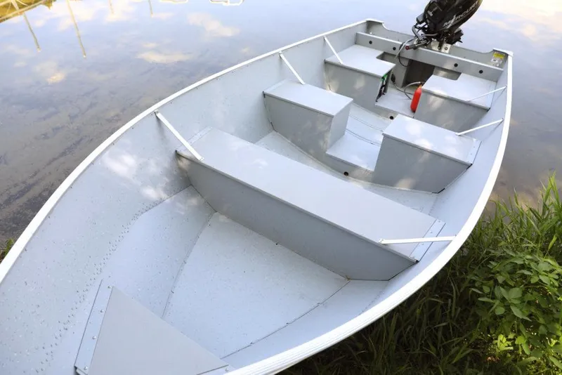 Slide: The Image of Manufacturer Provided Image: 2021 Lund SSV-16 boat on calm water, interior view. - 7