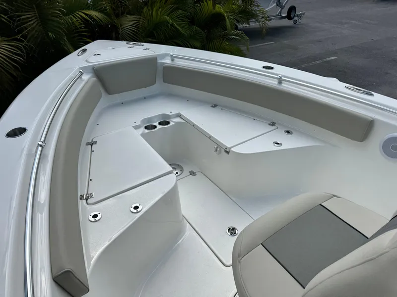 Slide: The Image of 2025 Key West 239 FS boat interior with seating and storage compartments. - 20