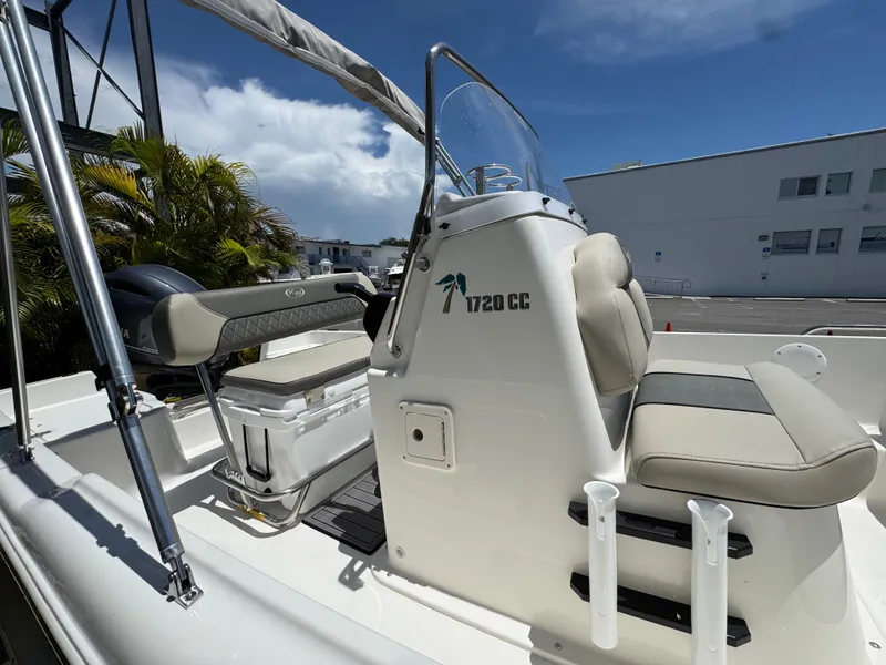 Slide: The Image of 2025 Key West 1720 Center Console boat with seating and console details. - 11