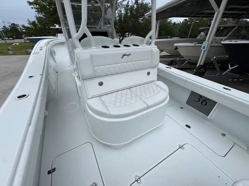 Slide: The Image of 2021 Yellowfin 36 Offshore boat interior with white seating and deck. - 31