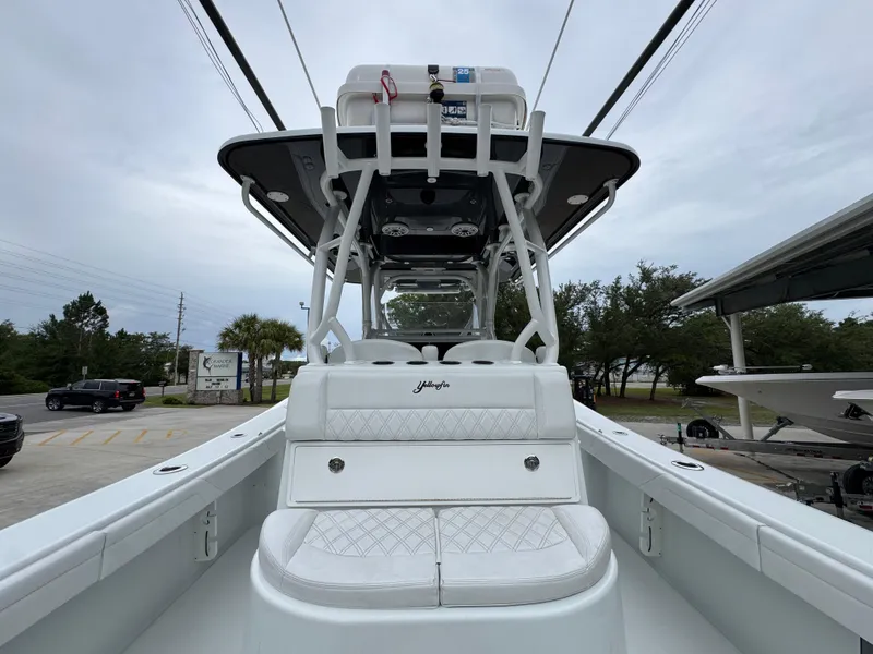 Slide: The Image of 2021 Yellowfin 36 Offshore boat with white seating and sleek design. - 32