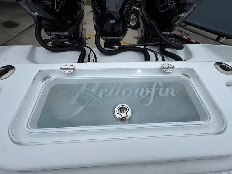 Slide: The Image of 2021 Yellowfin 36 Offshore boat with livewell and triple outboard engines. - 37