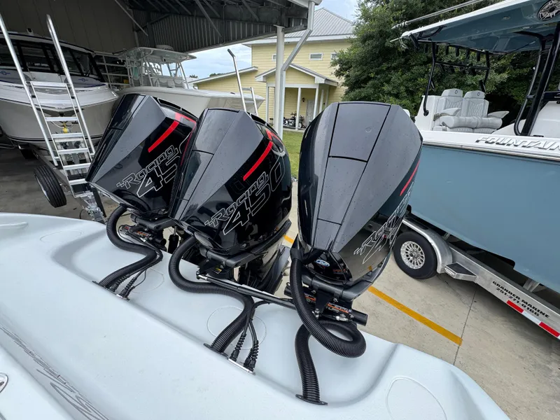 Slide: The Image of Triple Mercury Racing 450R engines on a 2021 Yellowfin 36 Offshore boat. - 38