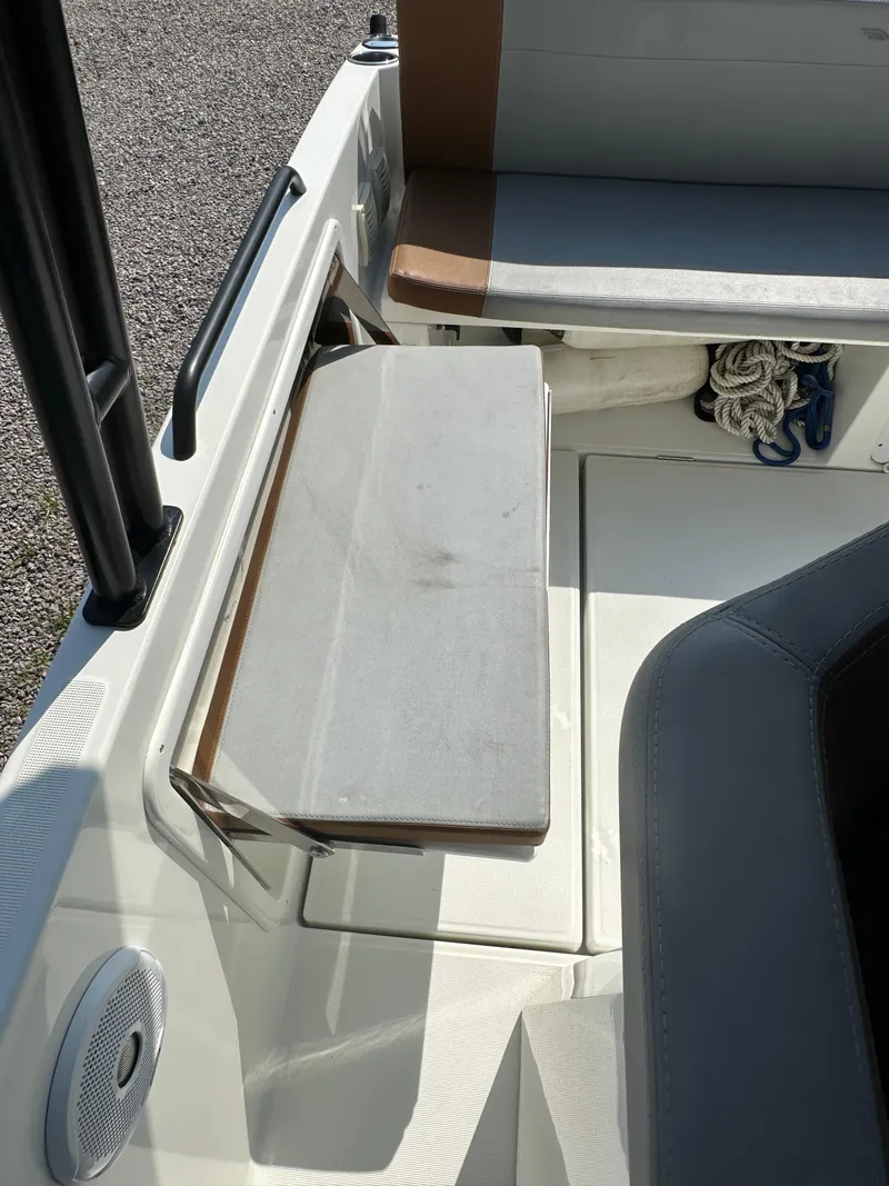 Slide: The Image of 2022 Beneteau Flyer 8 SUNdeck interior with seating and storage area. - 11