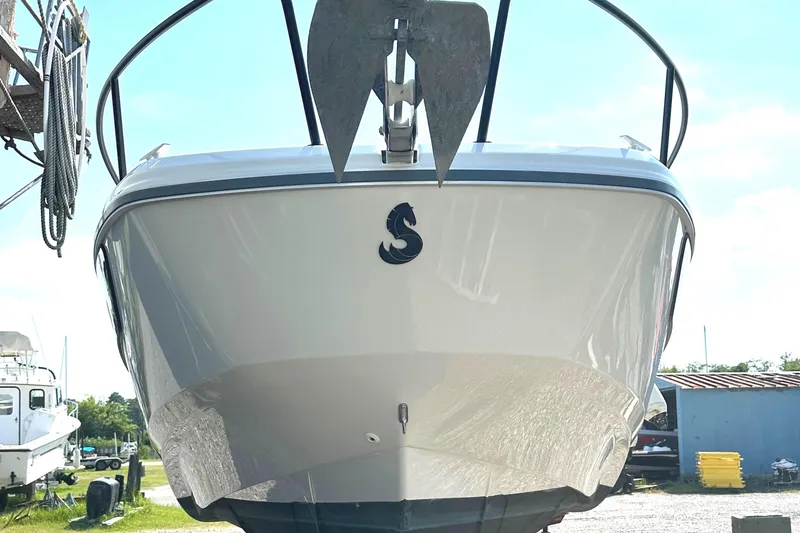 Slide: The Image of 2022 Beneteau Flyer 8 SUNdeck boat front view with anchor, outdoors. - 20