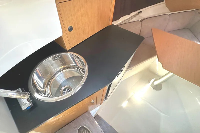 Slide: The Image of Interior of 2022 Beneteau Flyer 8 SUNdeck with sink and seating area. - 30