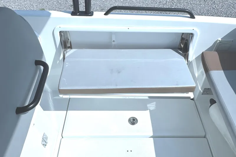 Slide: The Image of 2022 Beneteau Flyer 8 SUNdeck interior seating area with foldable bench and storage. - 34