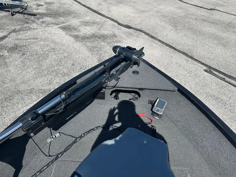 Slide: The Image of 2016 Lowe FM 165 Pro WT boat deck with trolling motor and fish finder. - 4