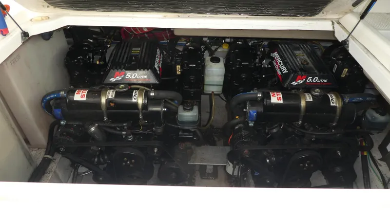 Slide: The Image of Engine compartment of a 2002 Maxum 3100 SCR with dual Mercury 5.0L engines. - 32