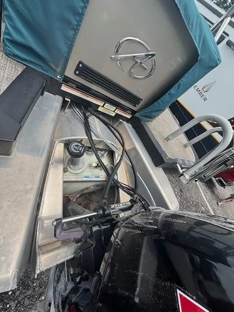 Slide: The Image of 2021 Avalon Catalina Quad Lounger boat engine and fuel compartment view. - 7