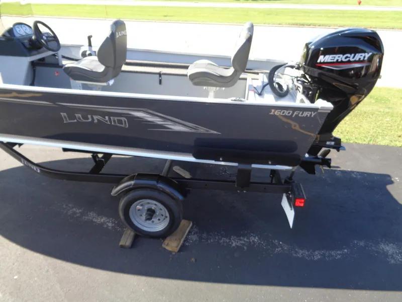 Slide: The Image of 2025 Lund 1600 Fury SS boat with Mercury engine on trailer. - 3