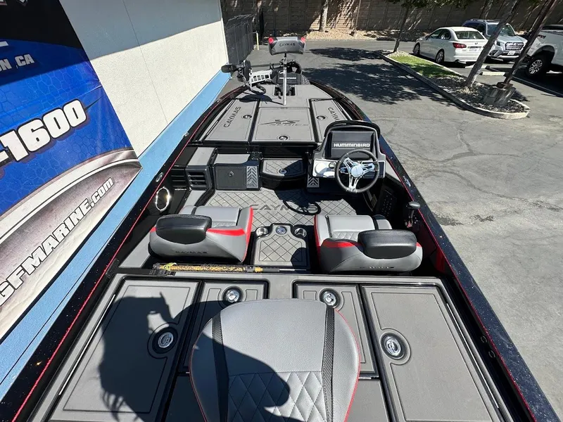 Slide: The Image of 2024 Caymas XS 20 Pro boat interior with advanced navigation and seating features. - 11