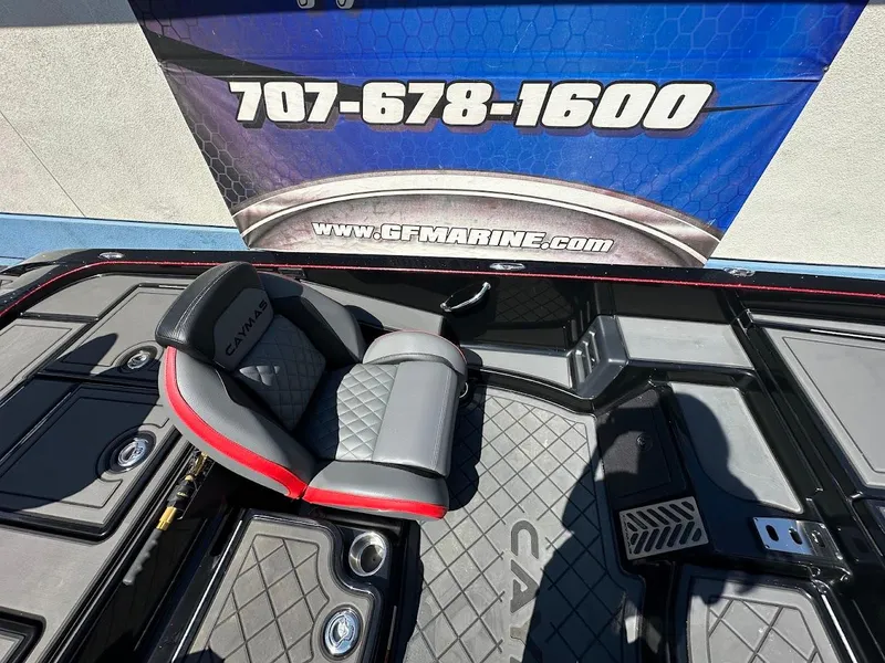 Slide: The Image of 2024 Caymas XS 20 Pro boat interior with custom seating and storage compartments. - 17