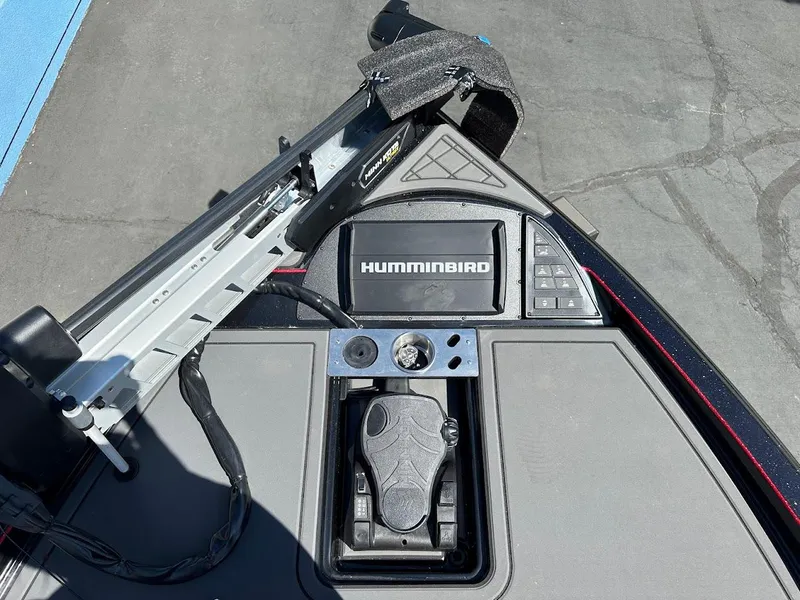 Slide: The Image of 2024 Caymas XS 20 Pro boat dashboard with Humminbird electronics and control panel. - 26