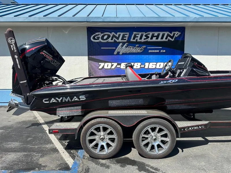 Slide: The Image of 2024 Caymas XS 20 Pro boat on trailer, displayed at Gone Fishin' Marine. - 7